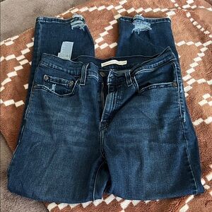 Levi's Dark Blue Women’s Skinny Jeans with Distressed Knees